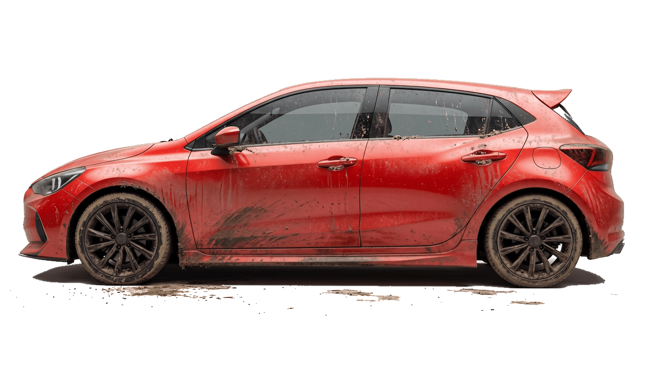Red hatchback covered in mud and road grime before detailing